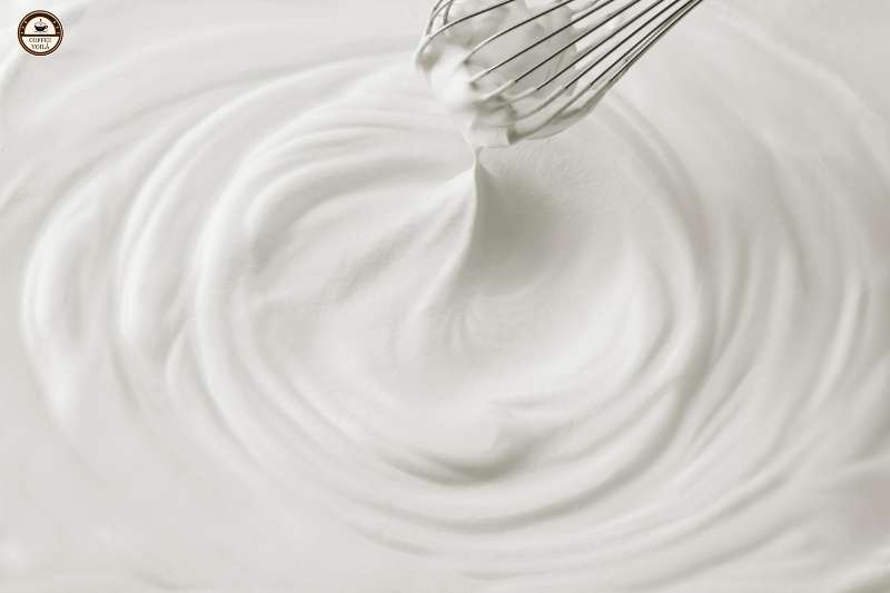 Pumpkin syrup over whipped cream