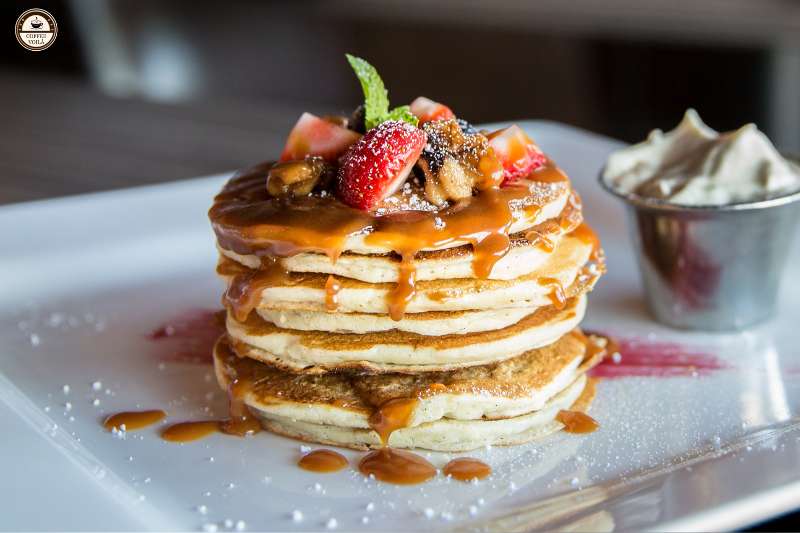 caramel syrup over pancakes