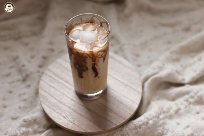 pour espresso syrup into your iced coffee